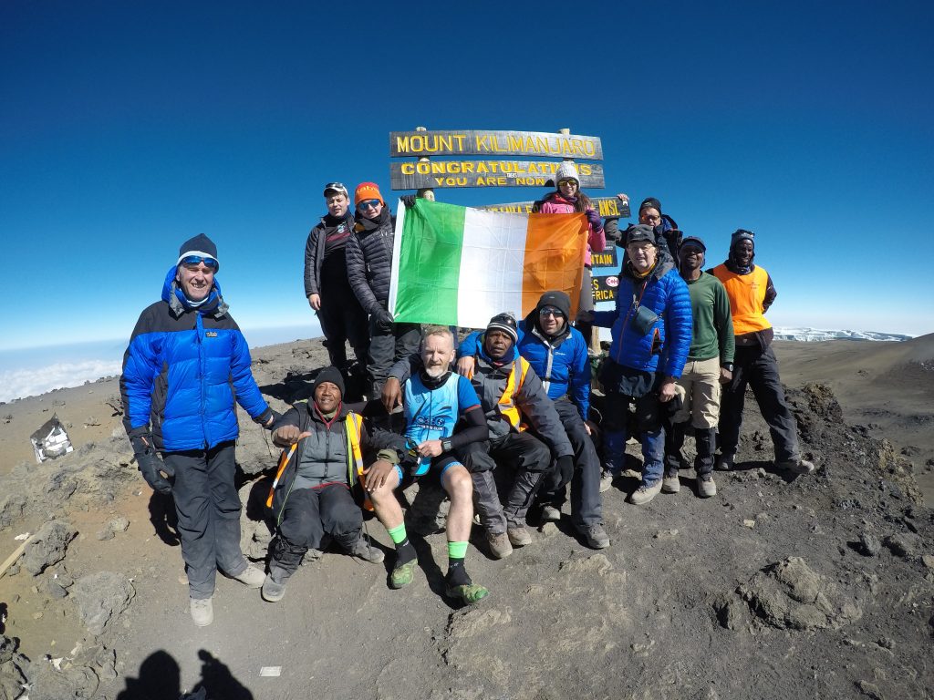 Team at summit of Kilimanjaro