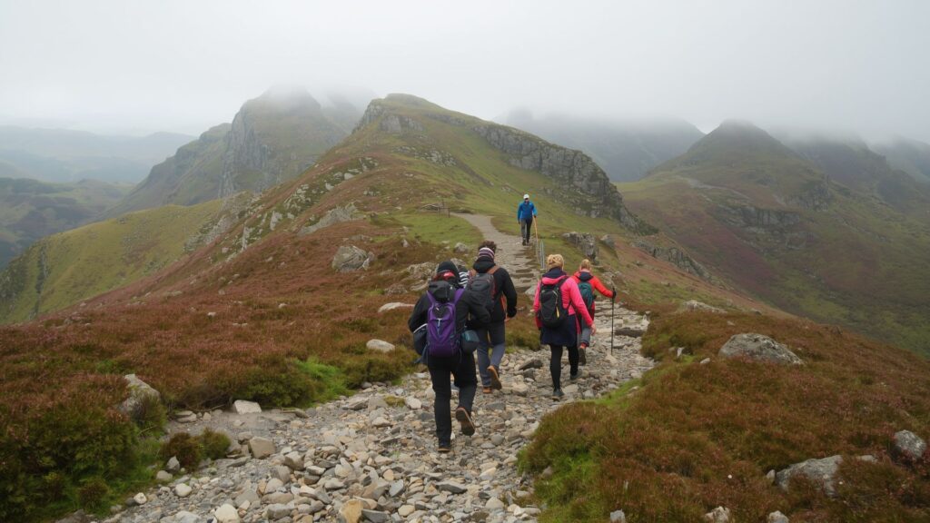 Maverick approach to mountaineering with guided group climbing Carrauntoohil trail in Kerry Ireland