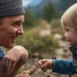 The power of listening demonstrated by mountain guide engaging with child on hiking trail in Kerry Ireland
