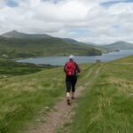 Walking to burn calories on Kerry coastal path with ocean views and hills