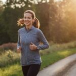 Person jogging outdoors showing benefits of exercise with depression during morning routine