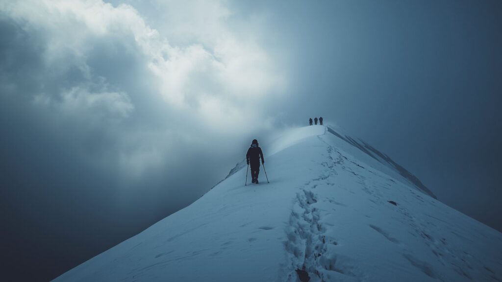 Demonstrating courage and wisdom by retreating from dangerous mountain conditions safely