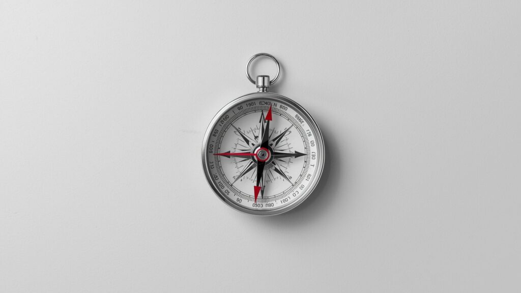 Using a compass requires understanding its basic parts including the magnetised needle and rotating bezel