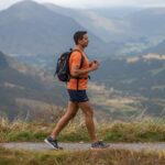 Walking properly with correct posture on Kerry mountain trail demonstrating proper head alignment and arm swing