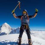 Pat Falvey performs the highest Puc Fada on Mt. Everest summit with hurley and sliotar at 8,848 metres