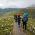 Essential tips for trekking shown through hikers ascending Irish mountain trail with proper gear and technique