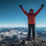 Cork explorer Pat Falvey celebrating summit success on mountain expedition