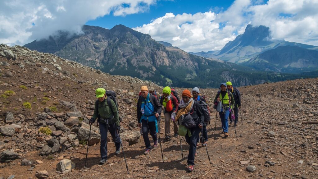Best time to climb Kilimanjaro during September showing dry season conditions with trekking groups on the popular Machame Route